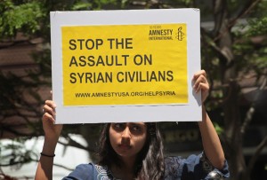 Syria - ataques a civiles - manifestación