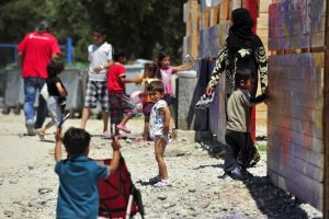 On 28 May 2016 in Greece, refugee and migrant children at Kara Tepe hospitality centre on the Greek island of Lesvos. The centre is run by the local municipality with the support of UNHCR and other partners. With its organisation and infrastructure, it serves as a model of the kind of support that Greece  with the right level of support  can offer to the refugee population. Lesvos lies close to Turkey, and was the first stopping point in Greece for thousands of refugees and migrants over the past year. Around 1,000 refugees and migrants stay in the Kara Tepe centre. UNICEF Goodwill Ambassador Nana Mouskouri visited Piraeus to see the work of UNICEF partners and civil society in response to the refugee and migrant crisis that has left some 54,000 people  including more than 22,000 children  stranded in different parts of Greece. Speaking after visiting refugee centres in Athens, Ms Mouskouri said she had been very moved by what she had seen and the refugees stories she had heard. These are very vulnerable people - children, women and men as well. They are very fragile. I see also on the other side that the Greek people are always very generous, and they are there to help. Greece continues to be one of the major entry points into Europe for refugees and migrants. Since January 2015, more than 1,012,000 refugees and migrants have arrived in Greece, most having survived hazardous water crossings from Turkey. Since the implementation of new border restrictions in the Balkans and the recent EU-Turkey agreement most refugees and migrants arriving to Greece have been prevented from moving on.