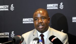 Deprose Muchena, Amnesty International's director for the Southern Africa region speaks at a news conference held by the organisation in Johannesburg to highlight human rights abuse, Wednesday, 25 February 2015. Picture: Werner Beukes/SAPA